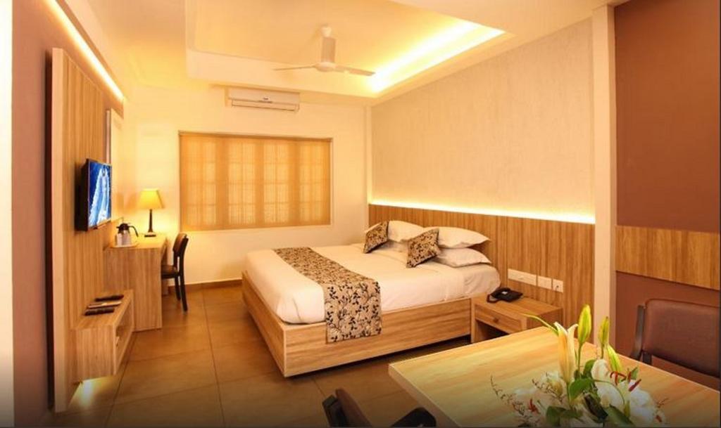 Hotel Luciya Palace Thrissur Zimmer foto